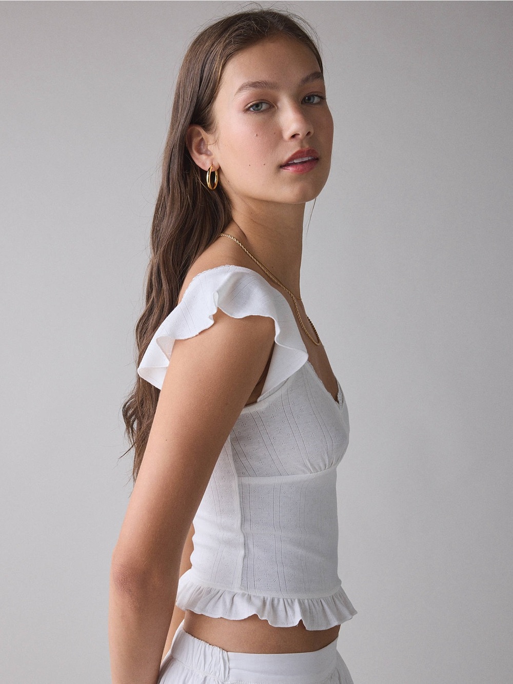 UO Kimchi Blue Posie Pointelle Knit Lace-Trim Ruffle Top in Ivory - Picture 4 of 9